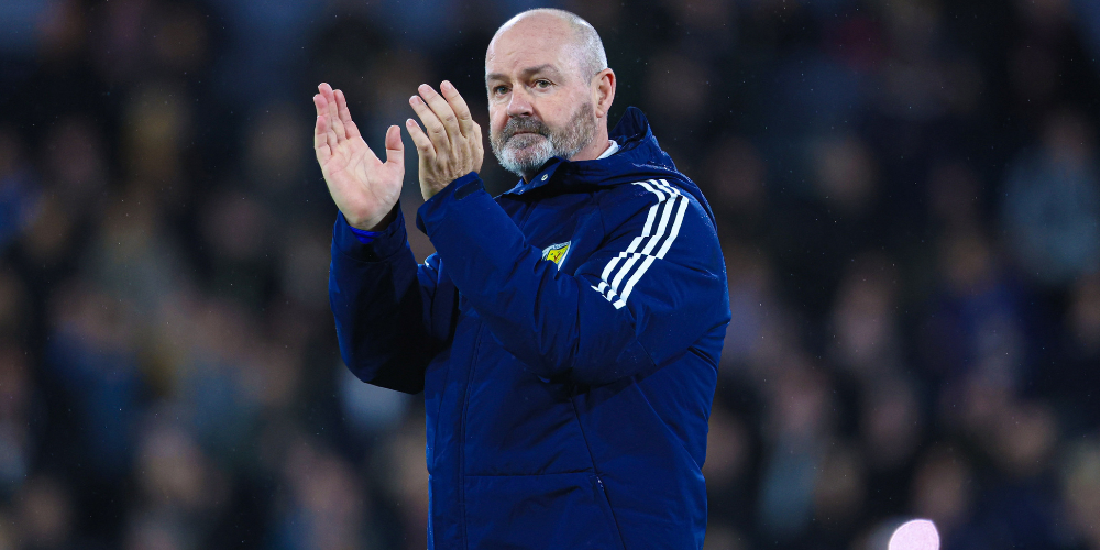 Steve Clarke applauds the Scotland supporters at Hampden Park