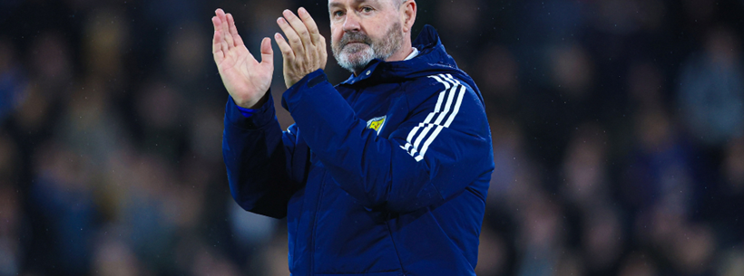 Steve Clarke applauds the Scotland supporters at Hampden Park
