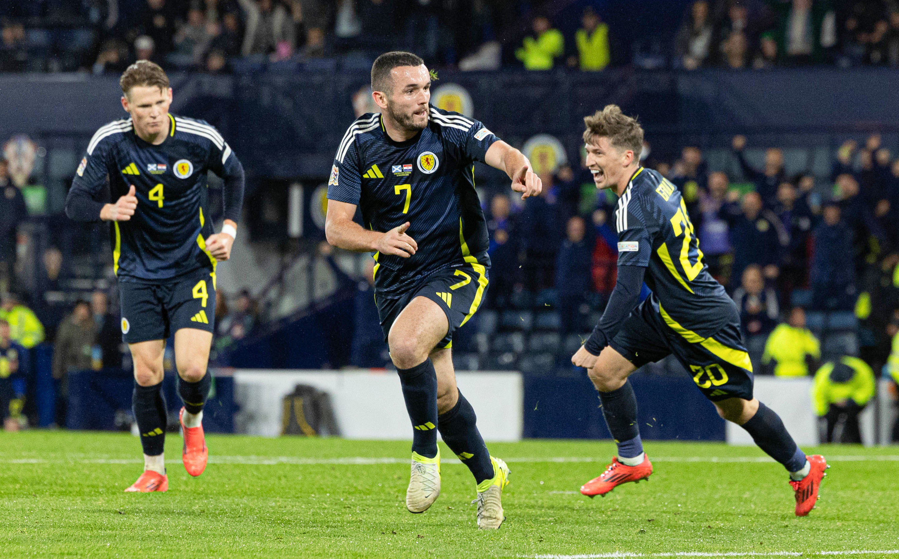 John McGinn celebrates late winner at Hampden Park