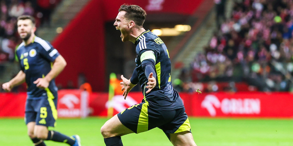 Andy Robertson heads home a late winner