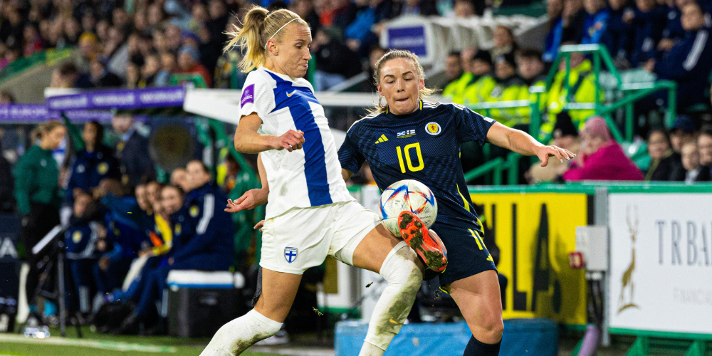 Kirsty Hanson battles for possession