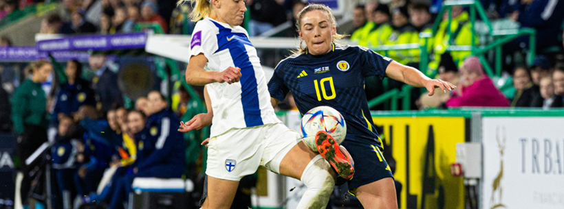 Kirsty Hanson battles for possession