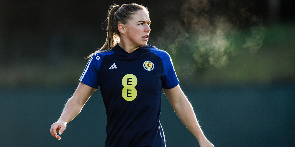Scotland player training with EE branding