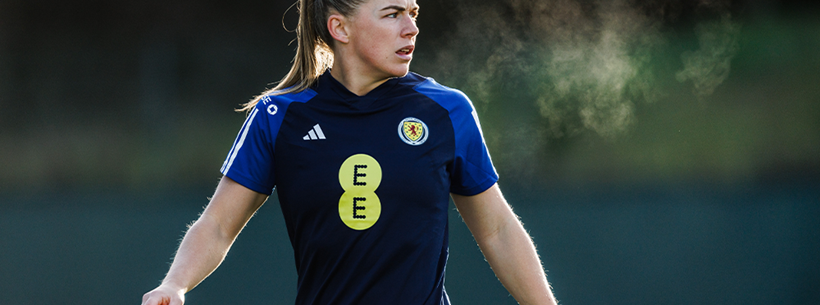 Scotland player training with EE branding