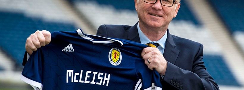Alex McLeish with a Scotland shirt.