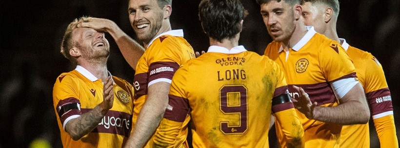 Motherwell book their place in the fifth round following dramatic shoot-out