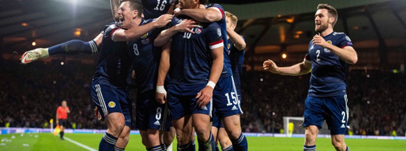 Scotland celebrating against Denmark